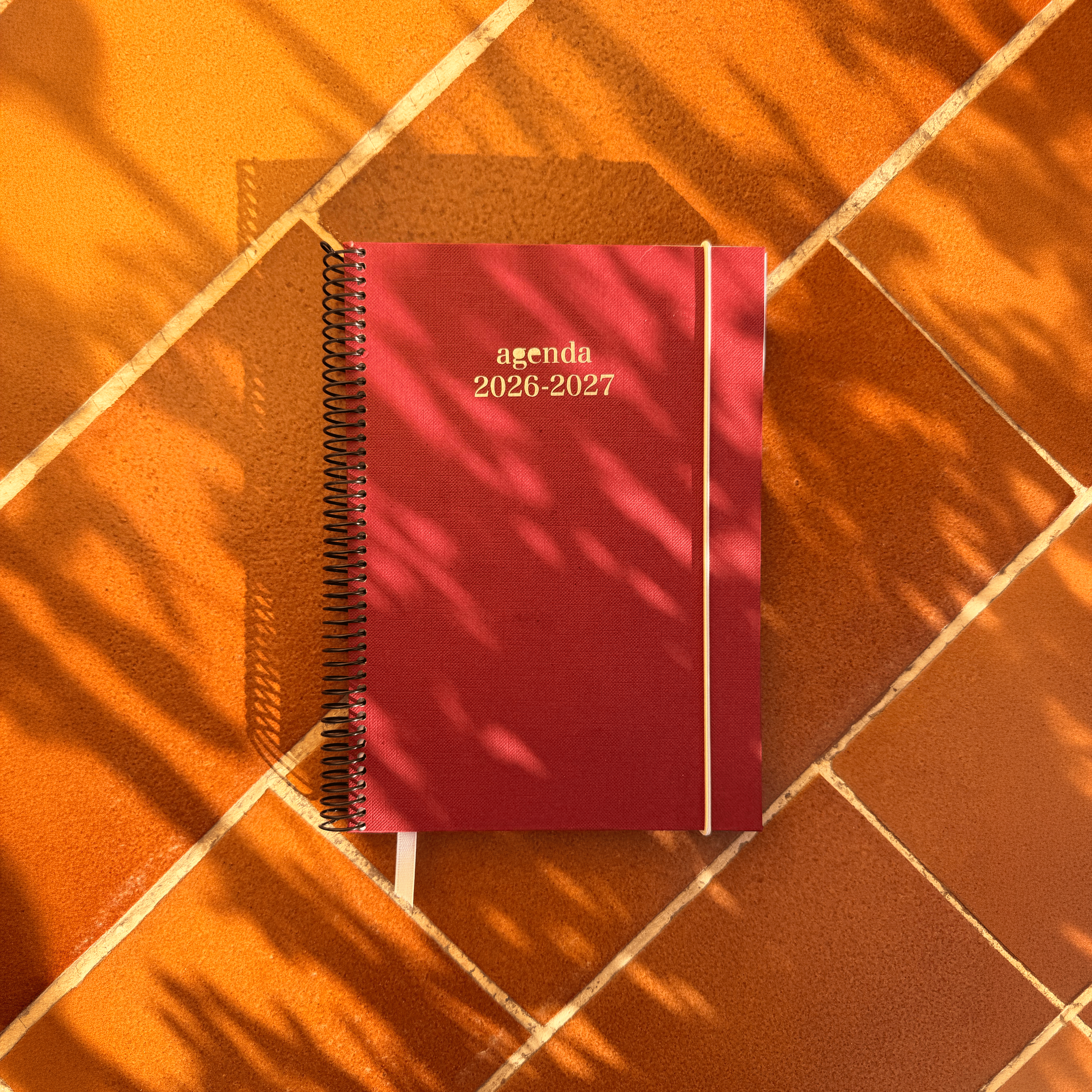 Agenda amb portada granat